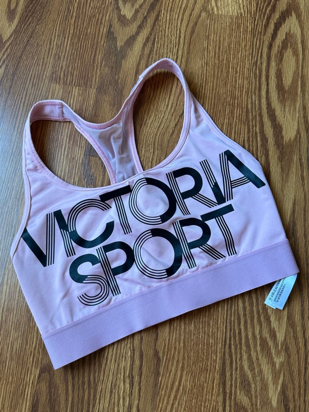 Victoria's Secret Light Pink Racerback Sports Bra with Bold Logo
